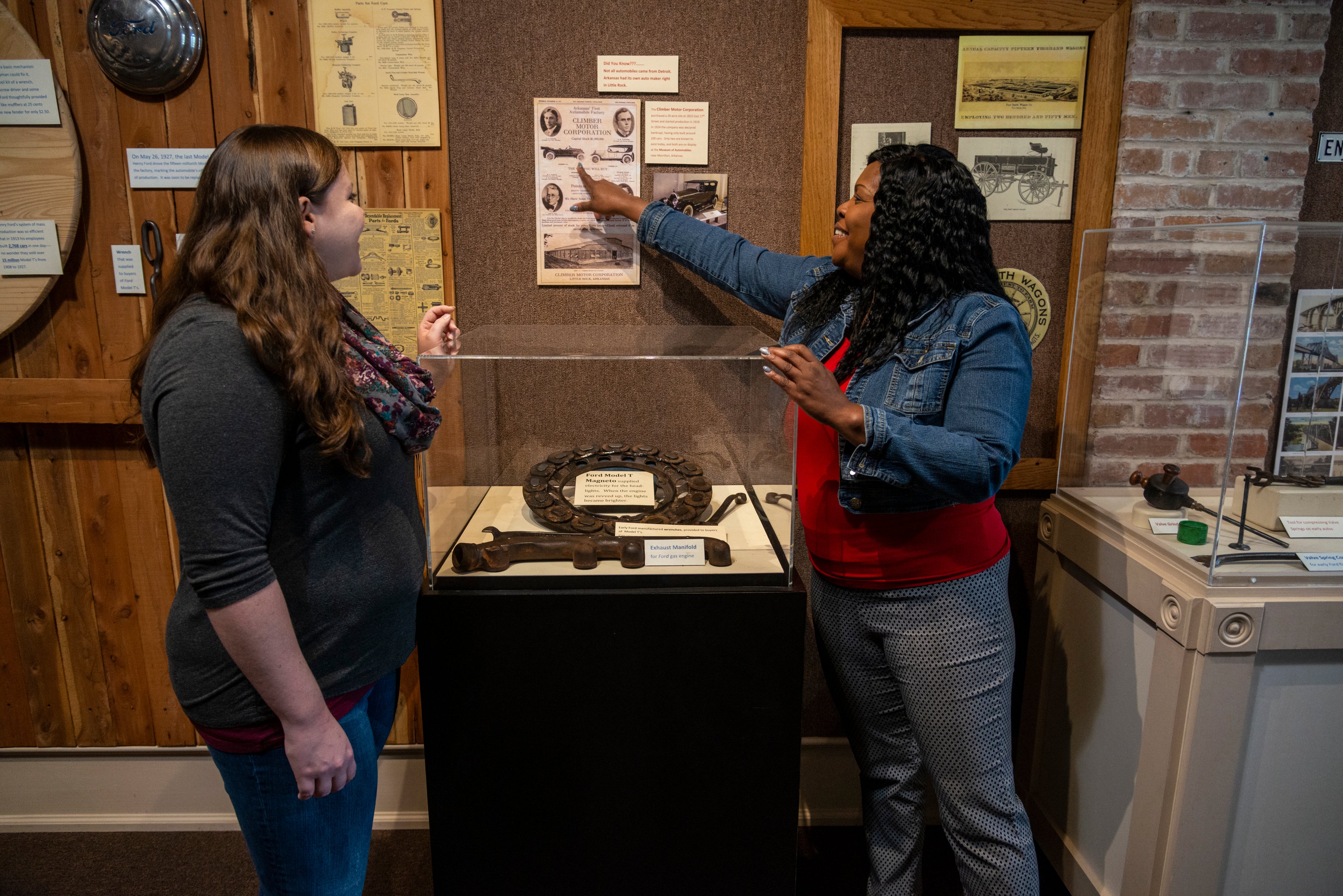 Two women exploring an exhibit at Plantation Agriculture Museum